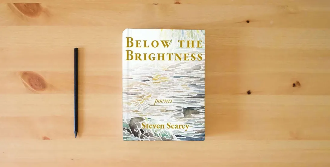 The book Below the Brightness} is on the table