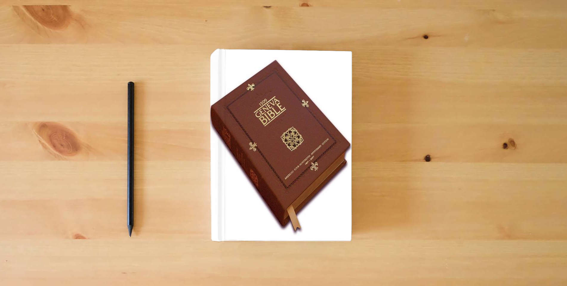 The book 1599 Geneva Bible (America's 400th Anniversary Edition) is on the table