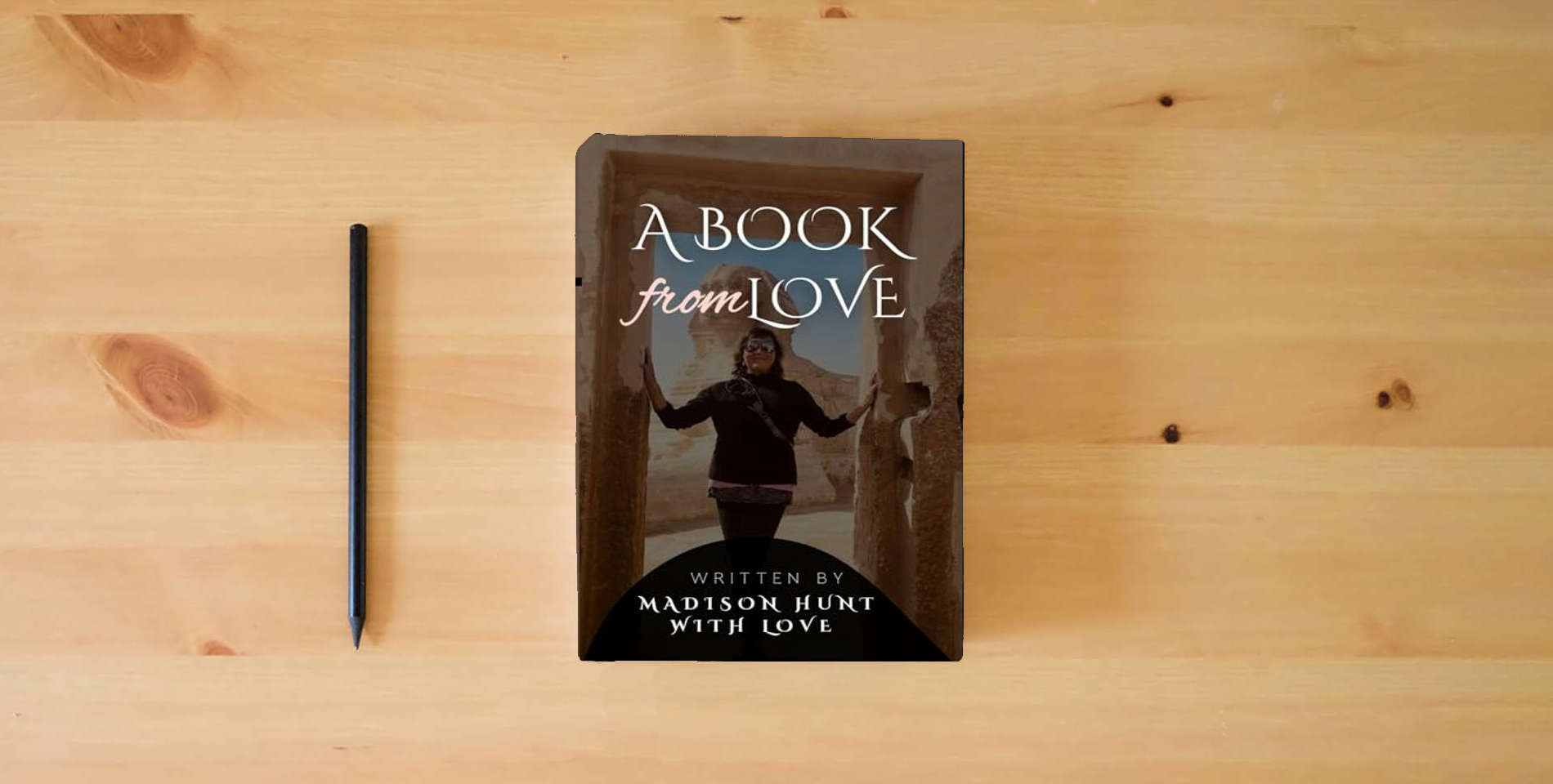 The book A Book From Love is on the table