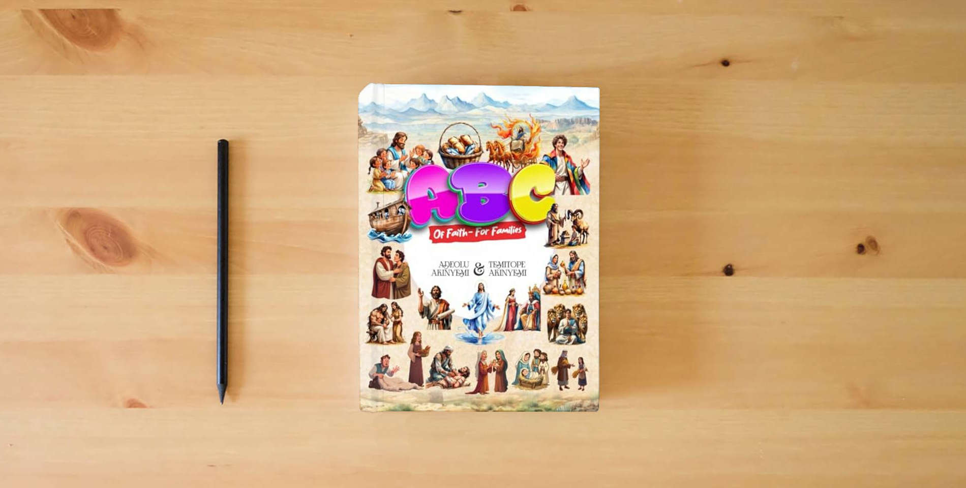 The book ABC OF FAITH FOR FAMILIES is on the table