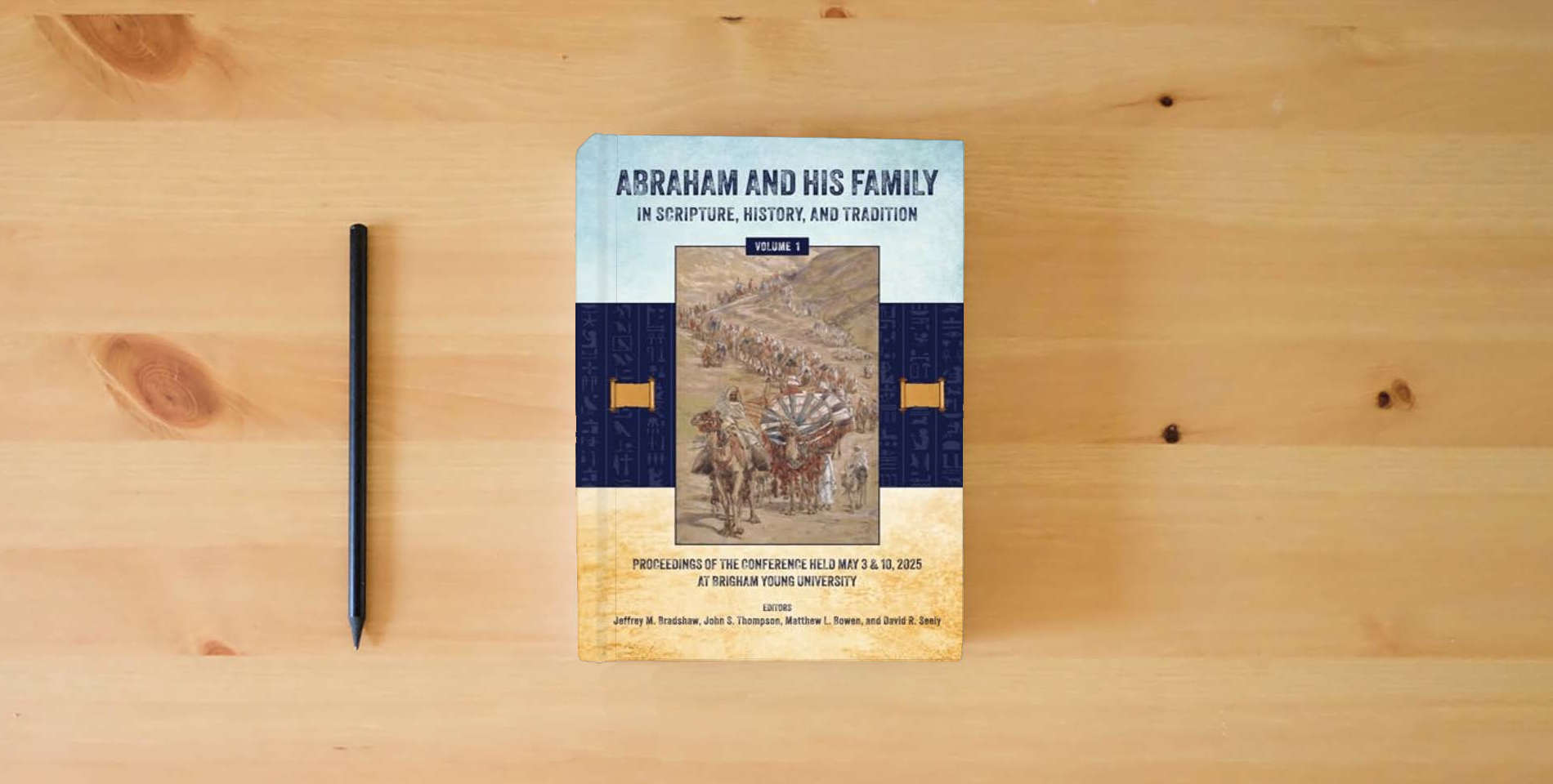 The book Abraham and His Family in Scripture, History, and Tradition (Volume 1, Color) is on the table