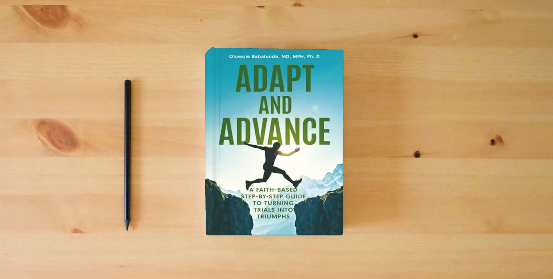 The book Adapt and Advance: A Faith-Based Step-by-Step Guide to Turning Trials into Triumphs is on the table