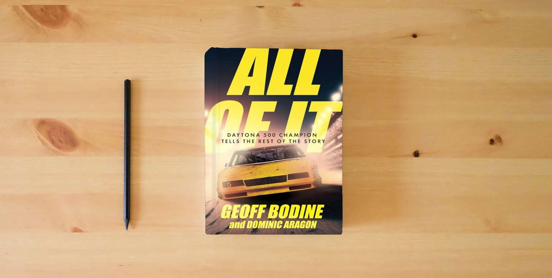 The book All of It: Daytona 500 Champion Tells the Rest of the Story is on the table