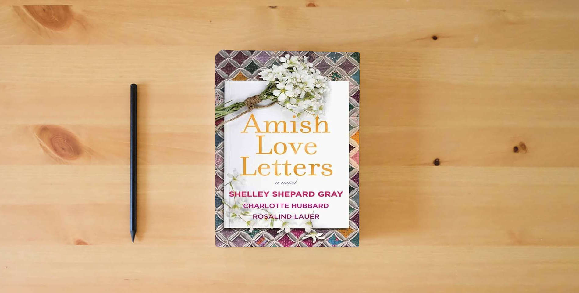 The book Amish Love Letters is on the table