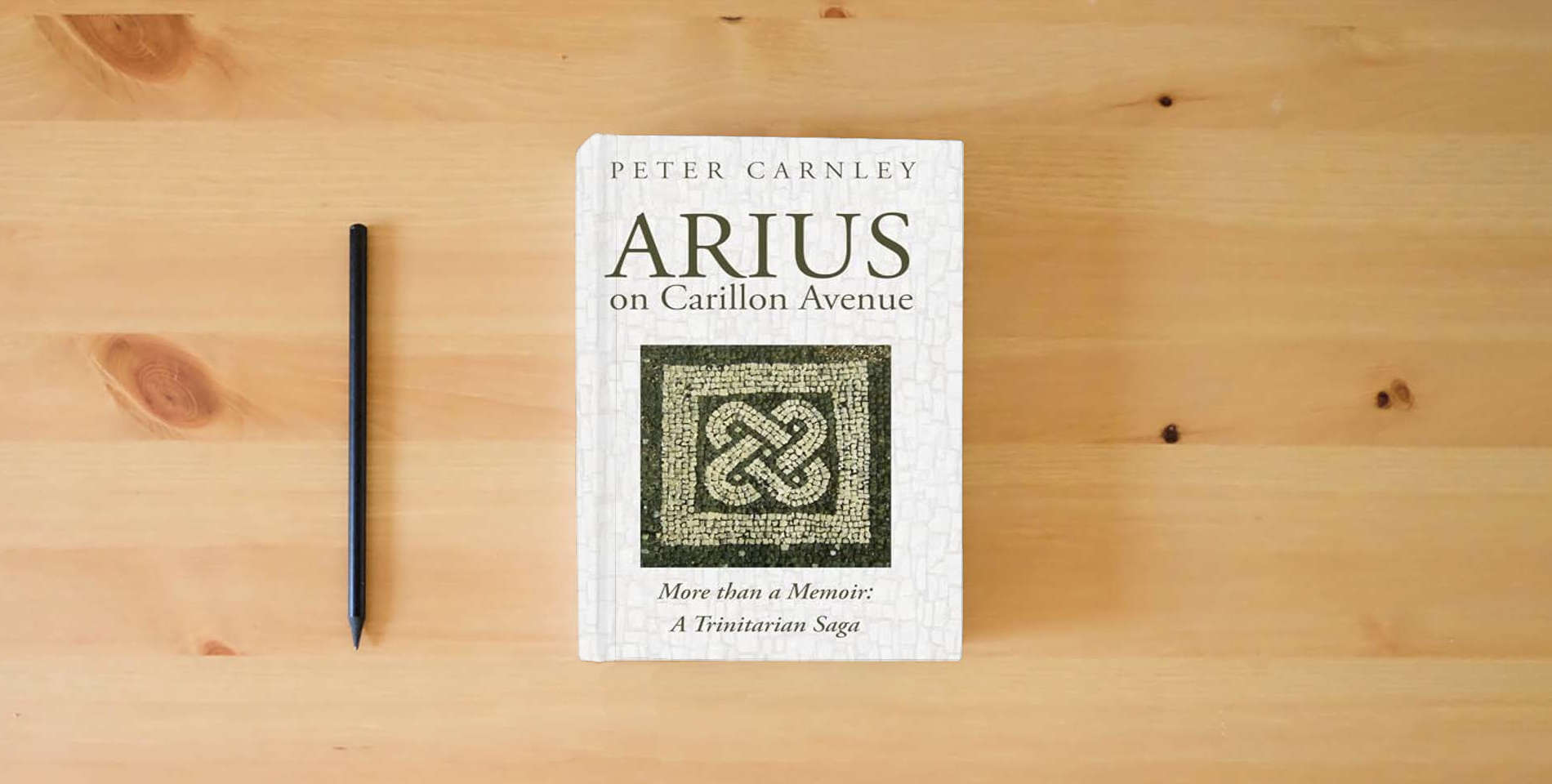 The book Arius on Carillon Avenue: More than a Memoir: A Trinitarian Saga is on the table