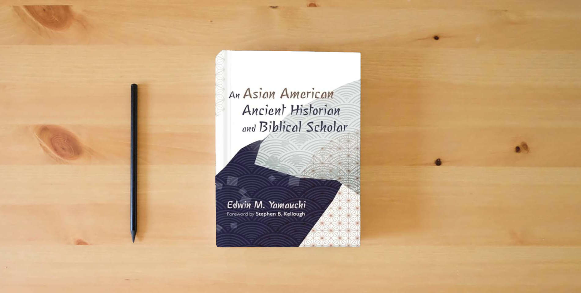 The book An Asian American Ancient Historian and Biblical Scholar is on the table