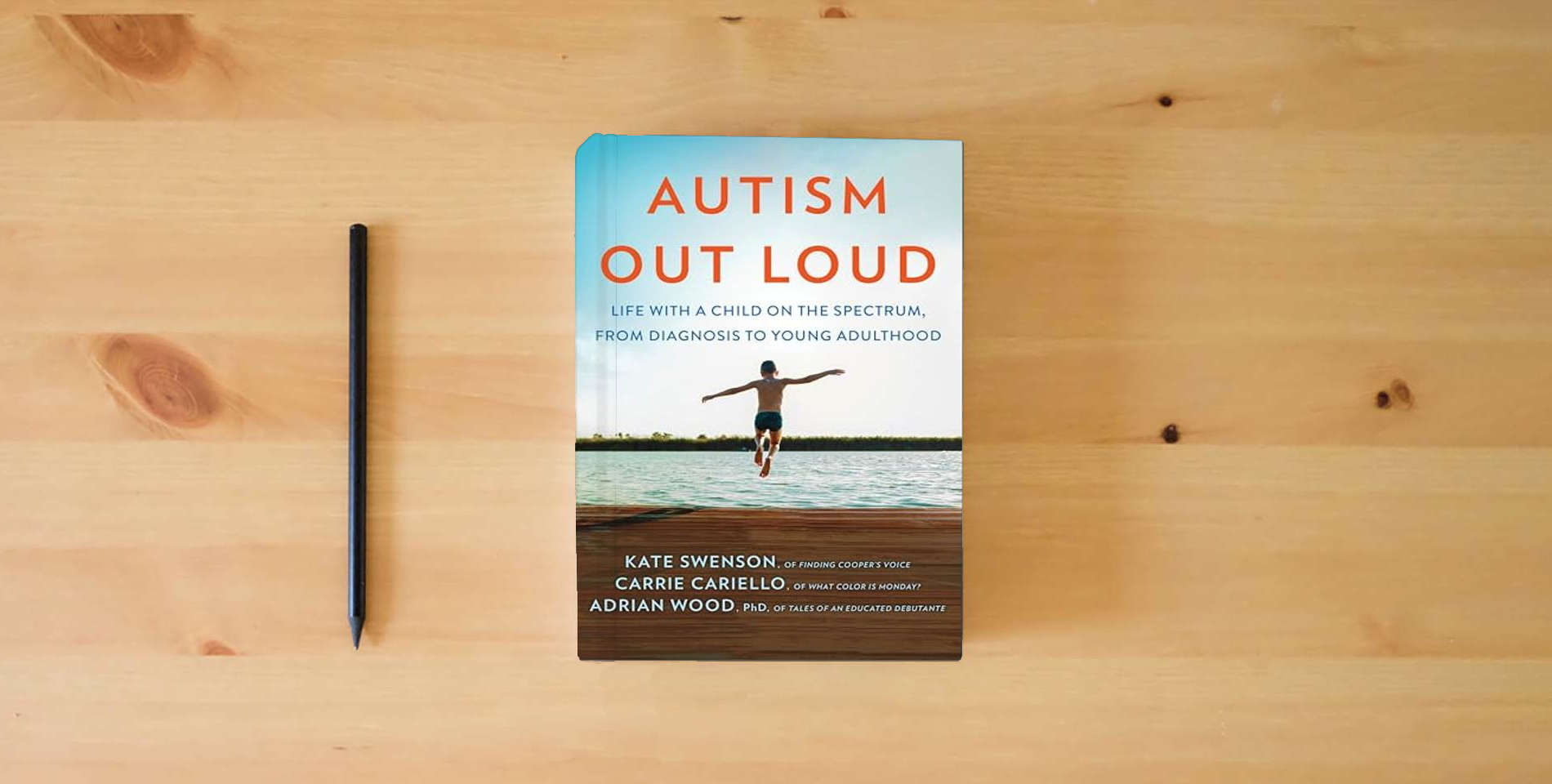 The book Autism Out Loud: Life with a Child on the Spectrum, from Diagnosis to Young Adulthood―Moving Stories and Parenting Lessons Learned from Three Mothers of Children with Autism is on the table