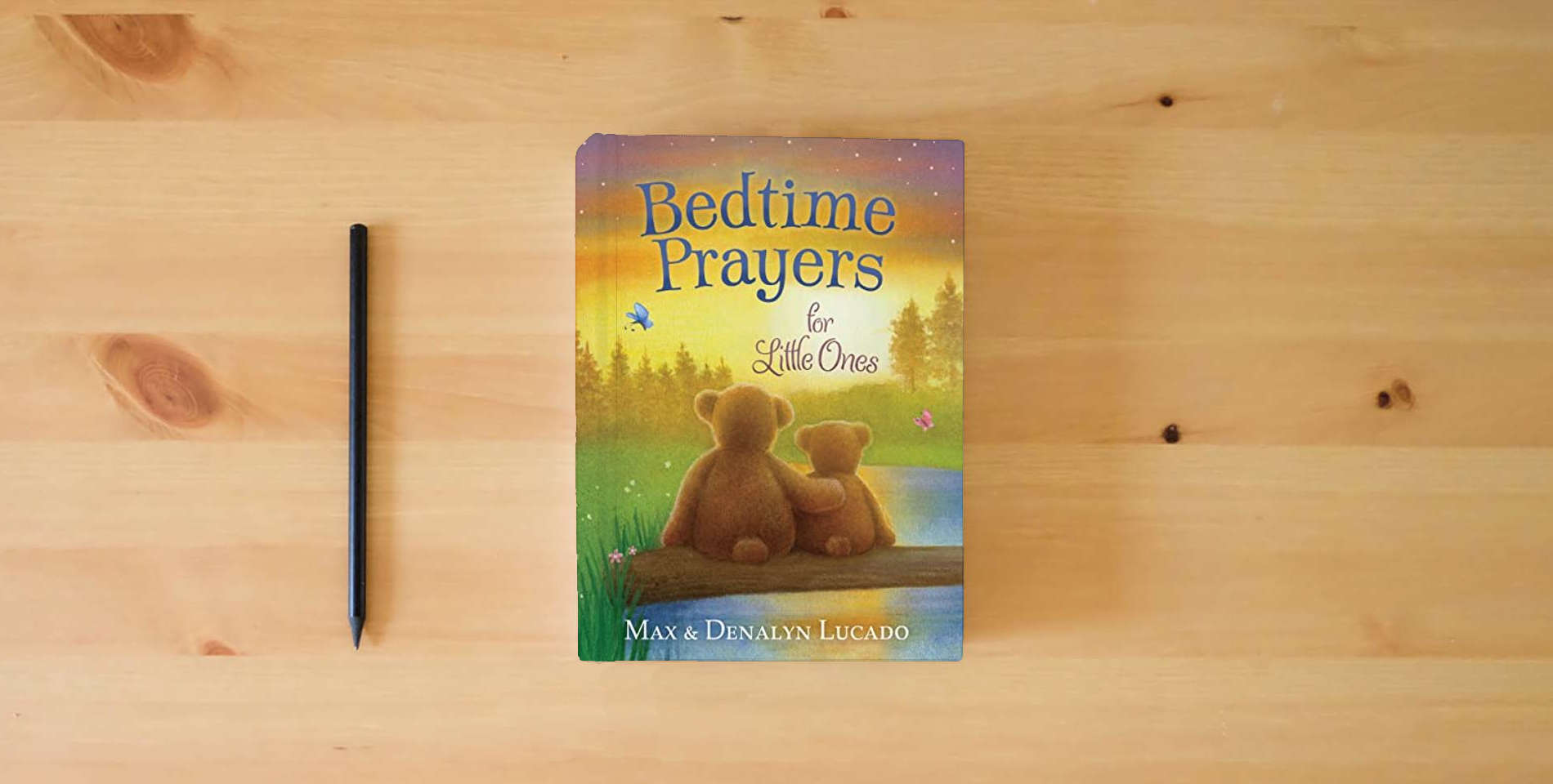 The book Bedtime Prayers for Little Ones (Max Lucado’s Bedtime Prayers for Little Ones) is on the table