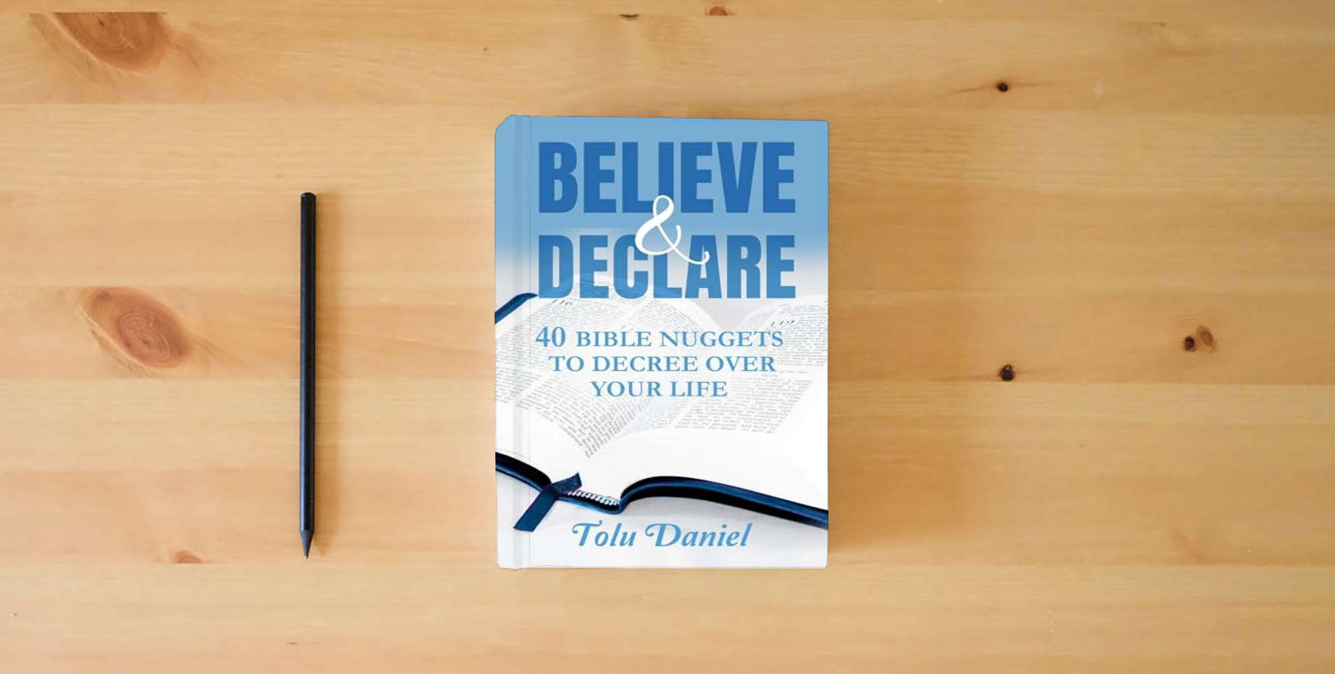 The book Believe & Declare: 40 Bible Nuggets to Decree Over Your Life is on the table
