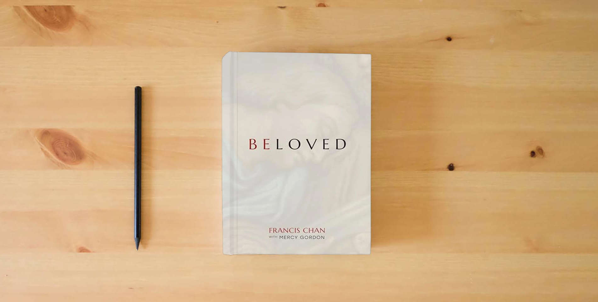 The book Beloved is on the table