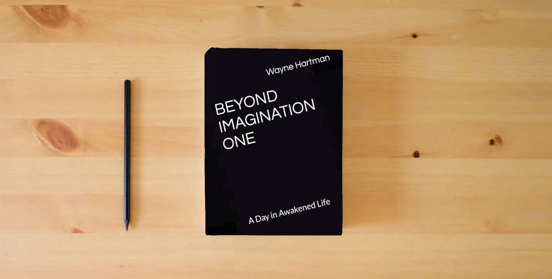 The book BEYOND IMAGINATION ONE: A Day in Awakened Life is on the table