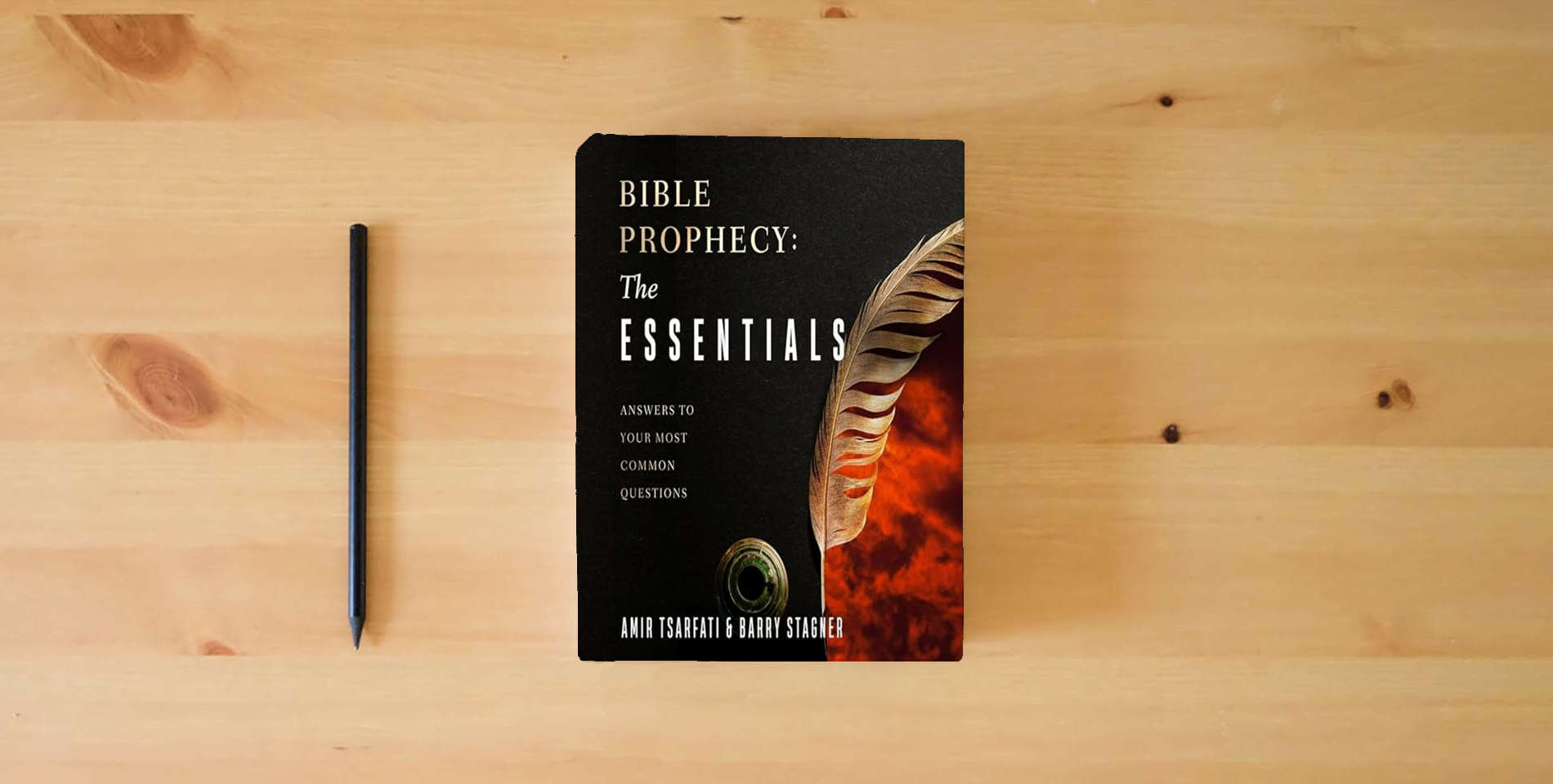 The book Bible Prophecy: The Essentials: What We Need to Know about the Last Days is on the table
