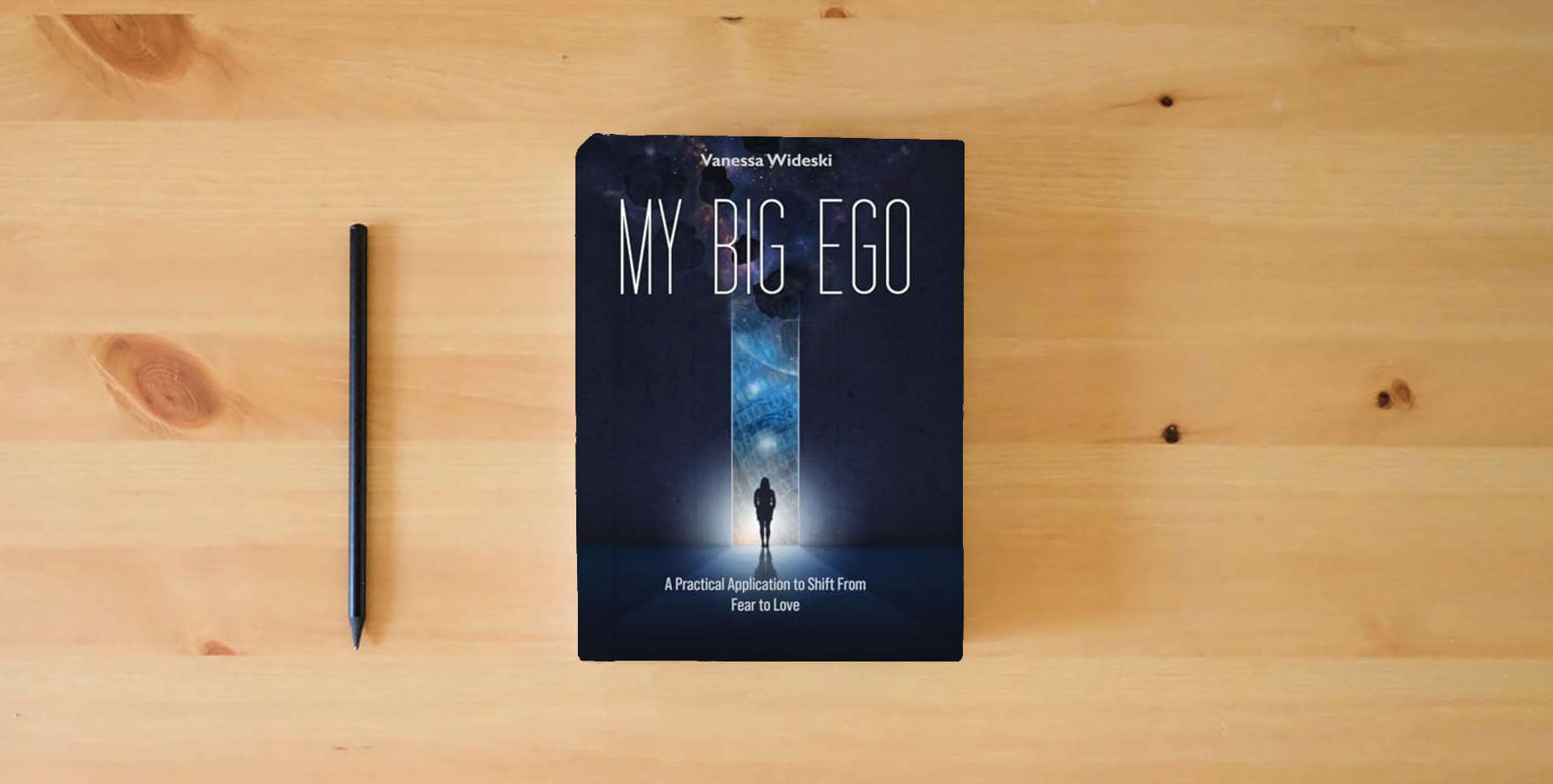 The book My Big Ego: A Practical Guide to Shifting from Fear to Love: A is on the table