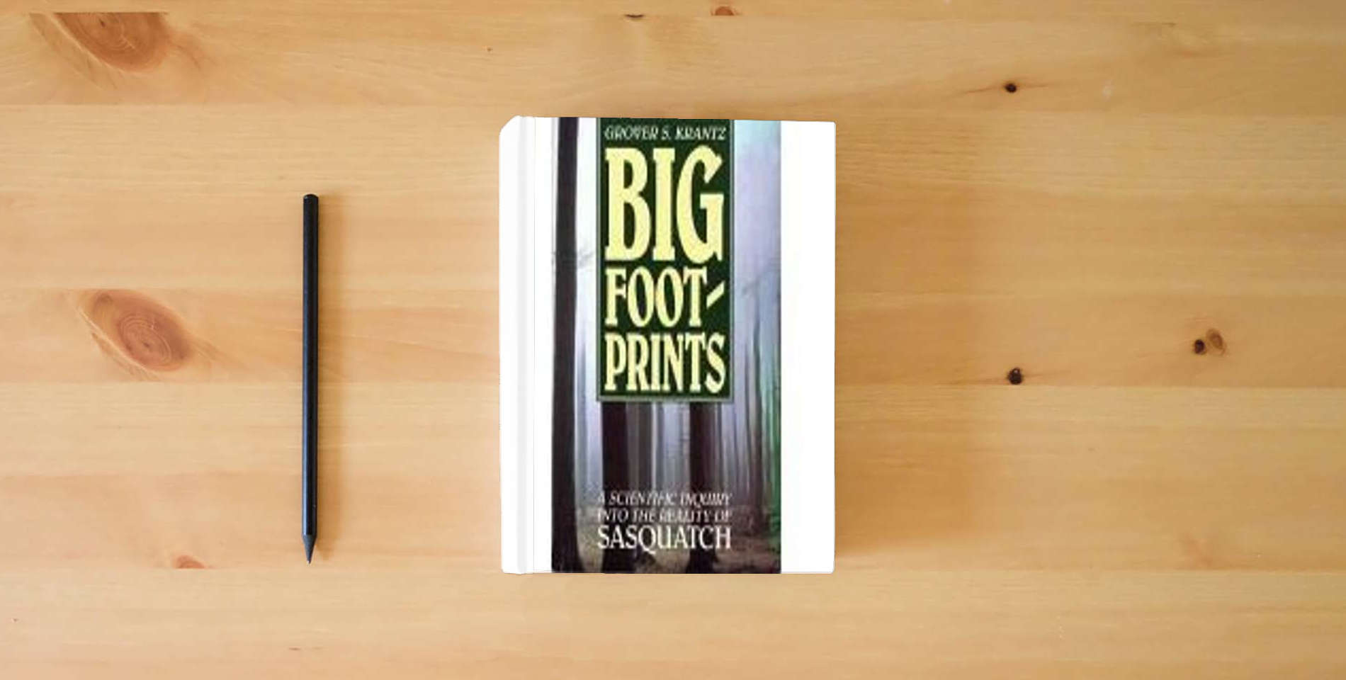 The book Big Foot-Prints: A Scientific Inquiry into the Reality of Sasquatch is on the table
