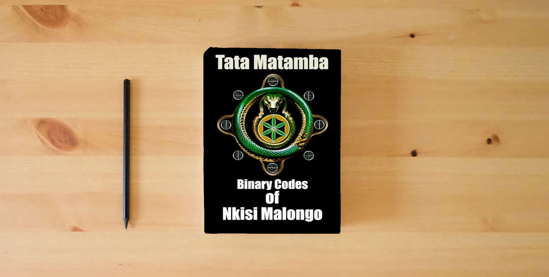 The book Binary Codes Of Nkisi Malongo is on the table