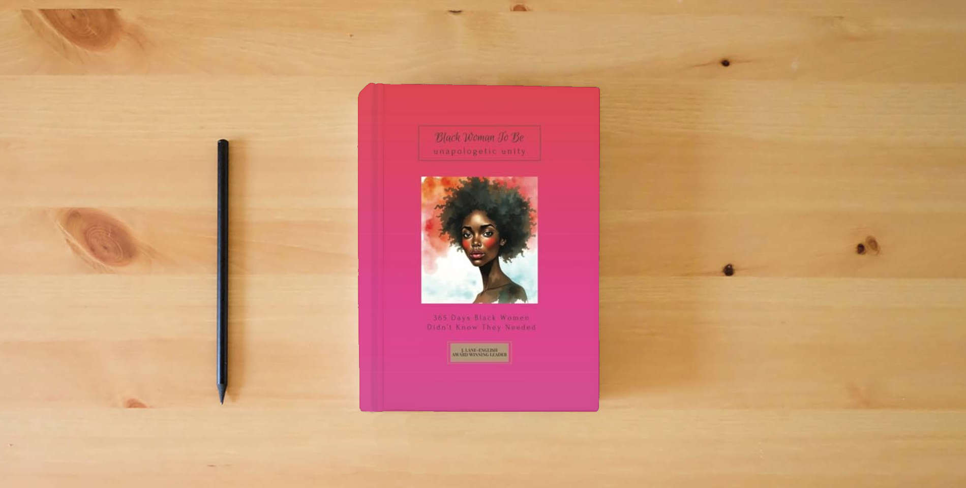The book Black Woman To Be: Unapologetic Unity, 365 Days Black Women Didn’t Know They Needed is on the table