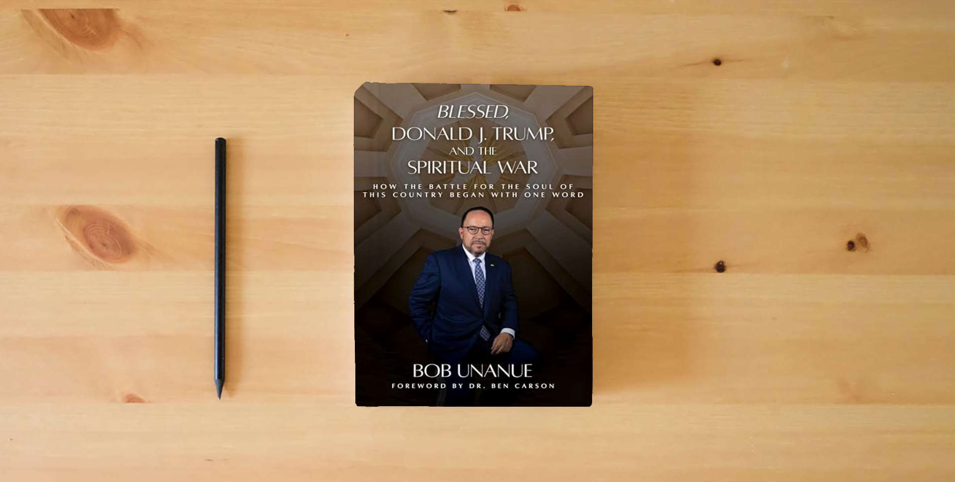 The book Blessed, Donald J. Trump, and the Spiritual War: How the Battle for the Soul of This Country Began with One Word is on the table