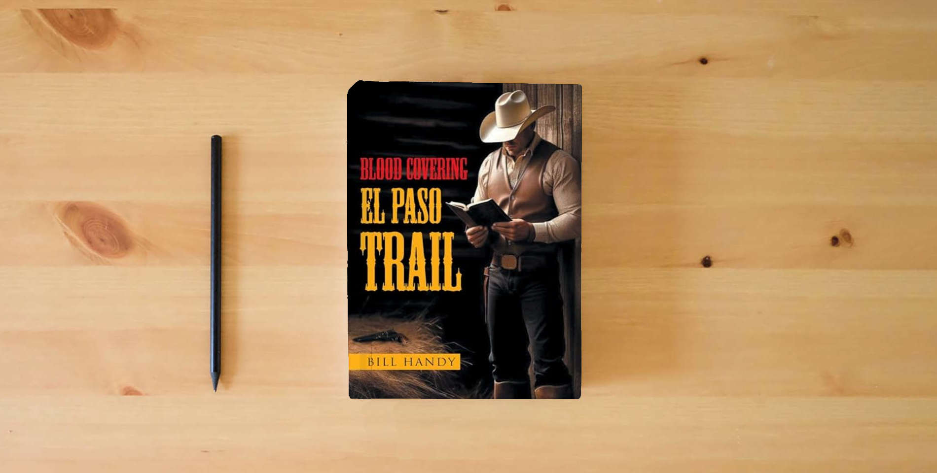 The book Blood Covering El Paso Trail is on the table