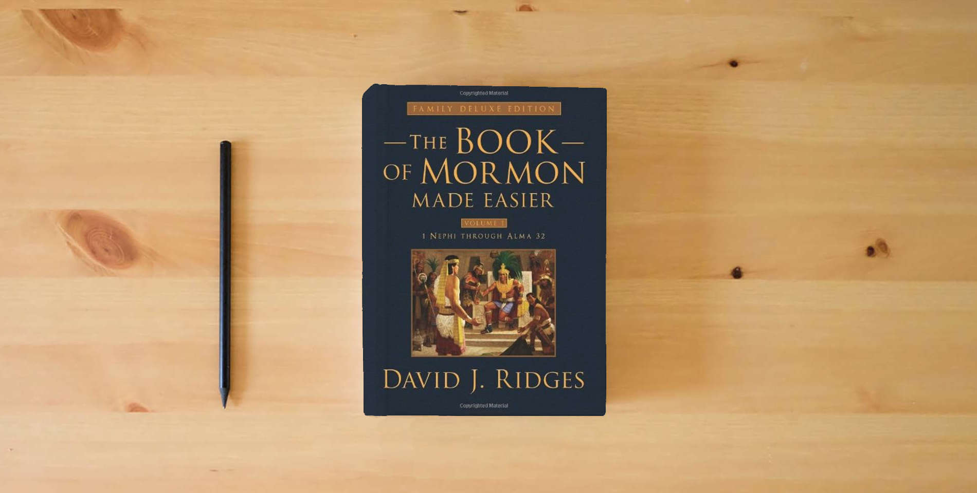 The book Book of Mormon Made Easier: Family Deluxe Edition Volume 1 (Gospel Studies Series) is on the table