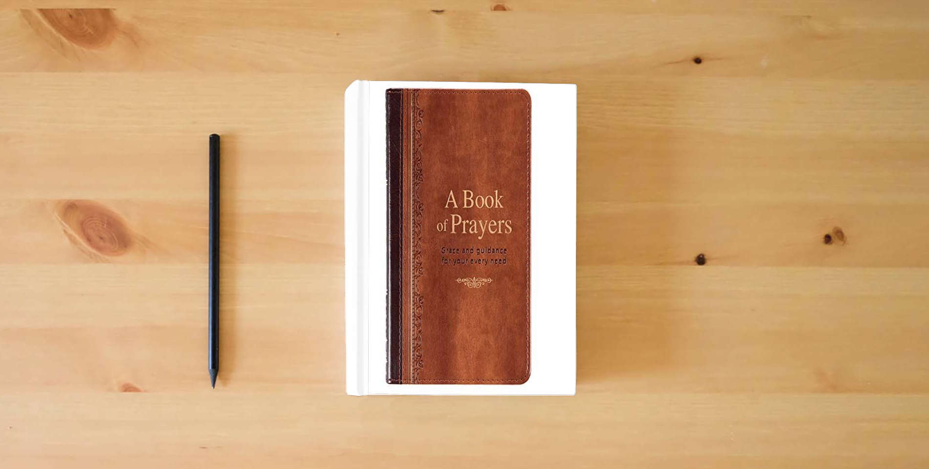 The book A Book of Prayers - Grace and Guidance for Your Every Need is on the table