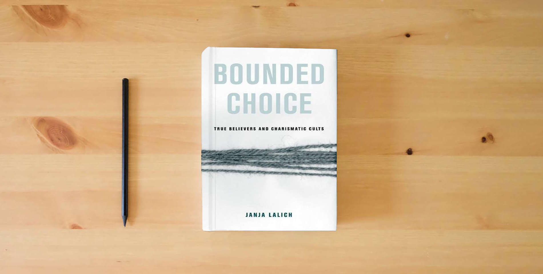 The book Bounded Choice: True Believers and Charismatic Cults is on the table