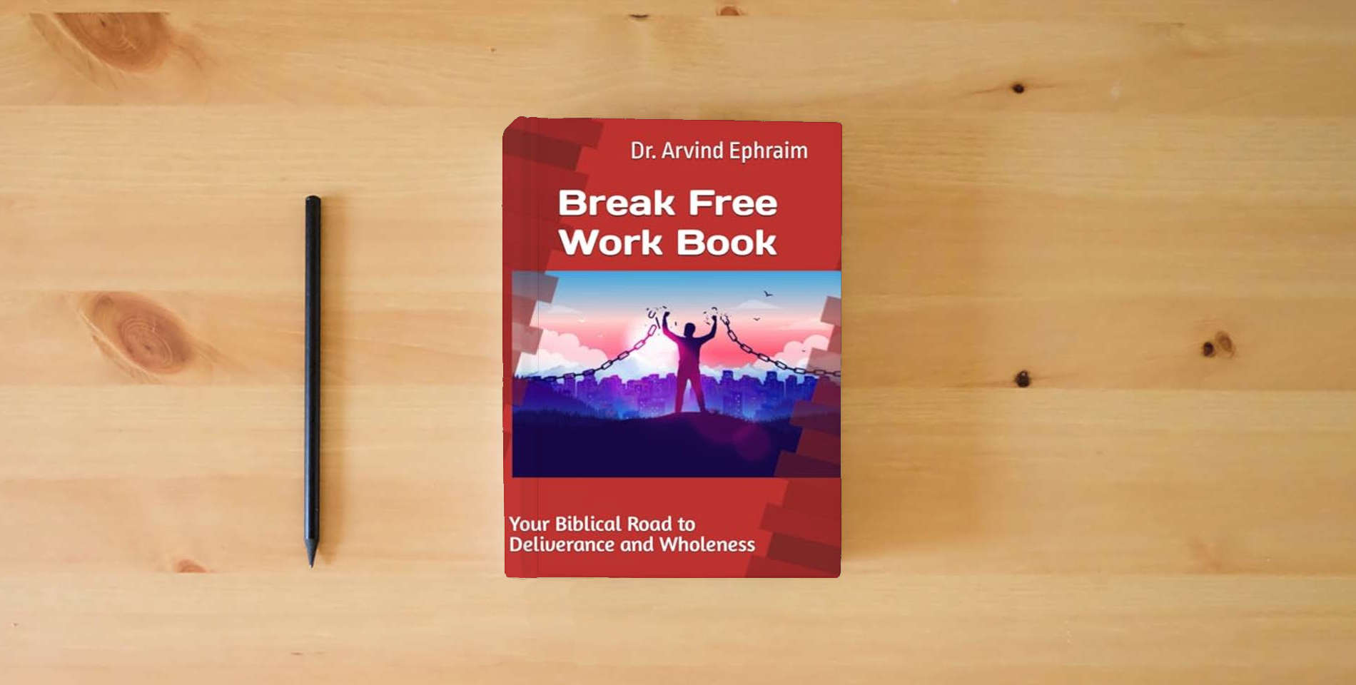 The book Break Free: Work Book: Your Biblical Road to Deliverance and Wholeness is on the table