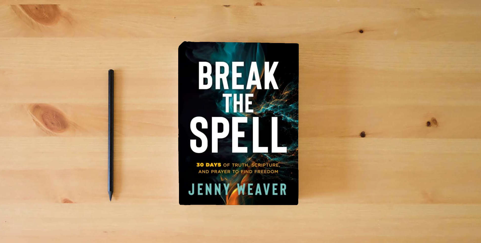 The book Break the Spell: 30 Days of Truth, Scripture, and Prayer to Find Freedom is on the table