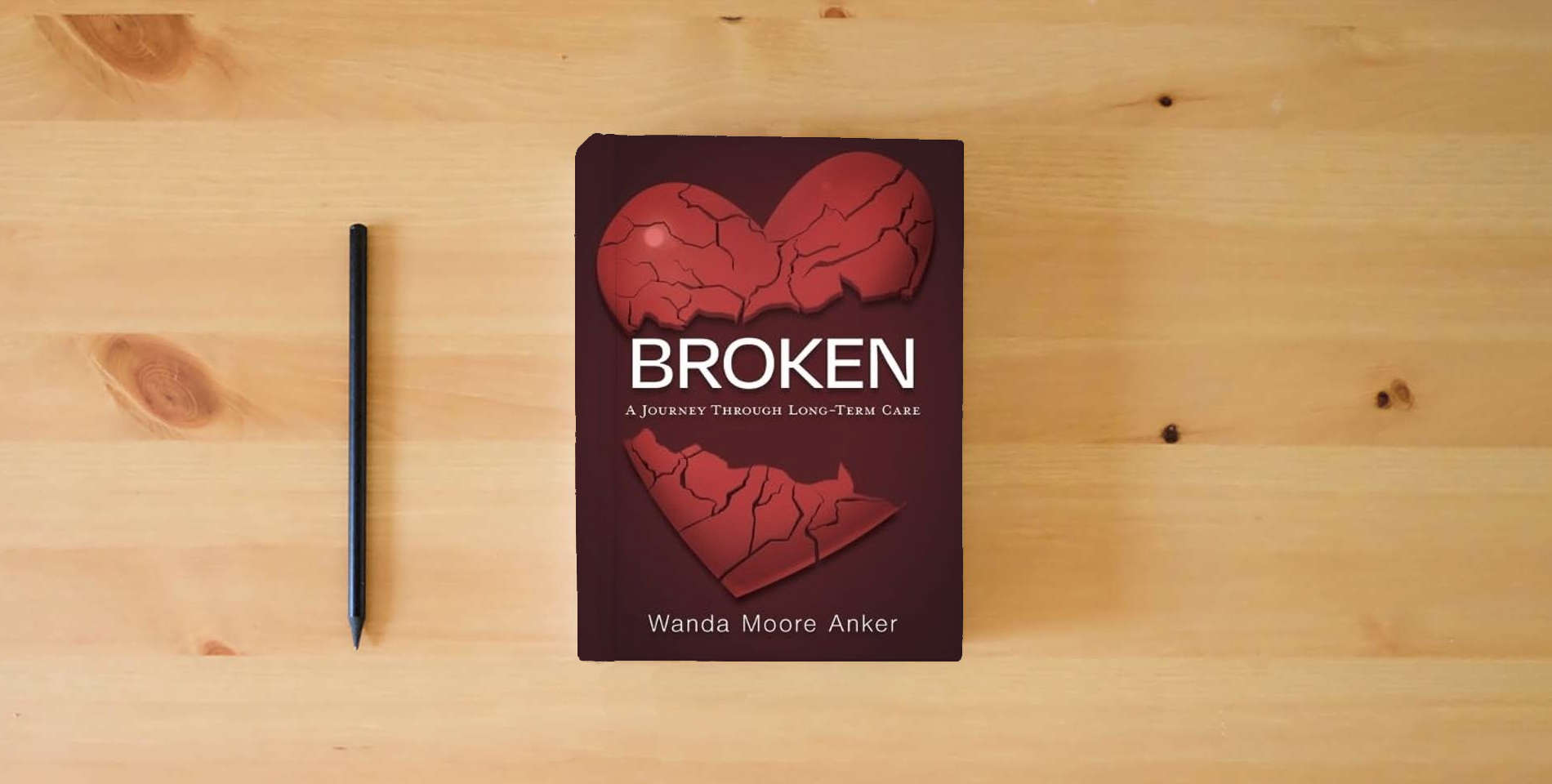 The book Broken: A Journey Through Long Term Care is on the table