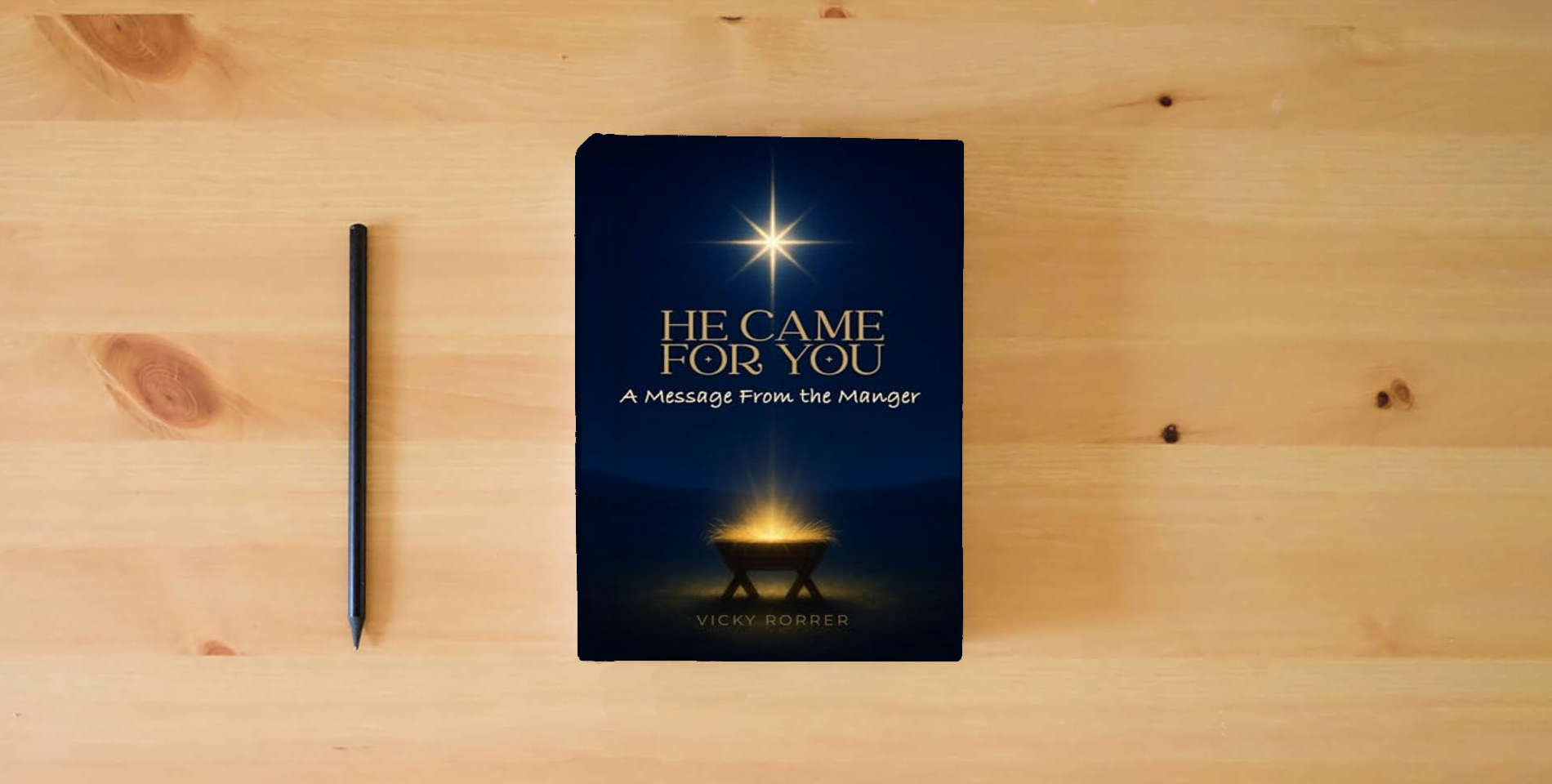 The book HE CAME FOR YOU: A Message From the Manger is on the table