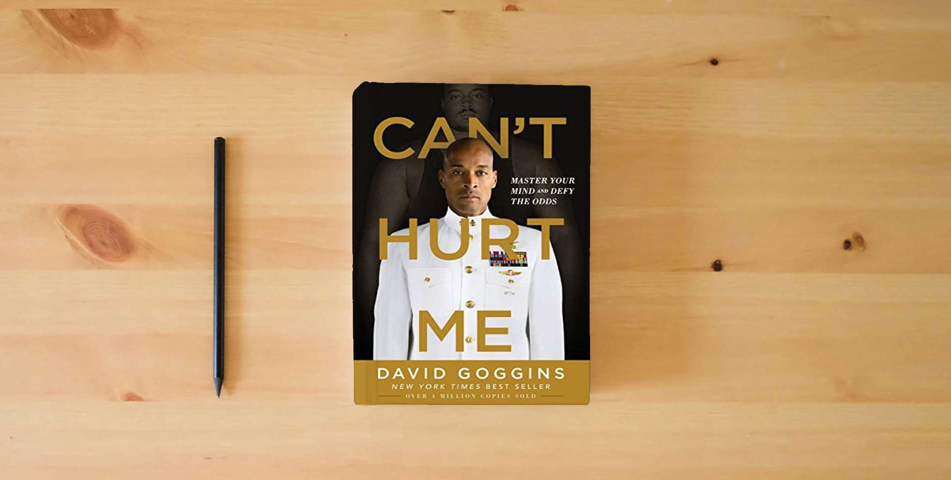 The book Can't Hurt Me: Master Your Mind and Defy the Odds is on the table