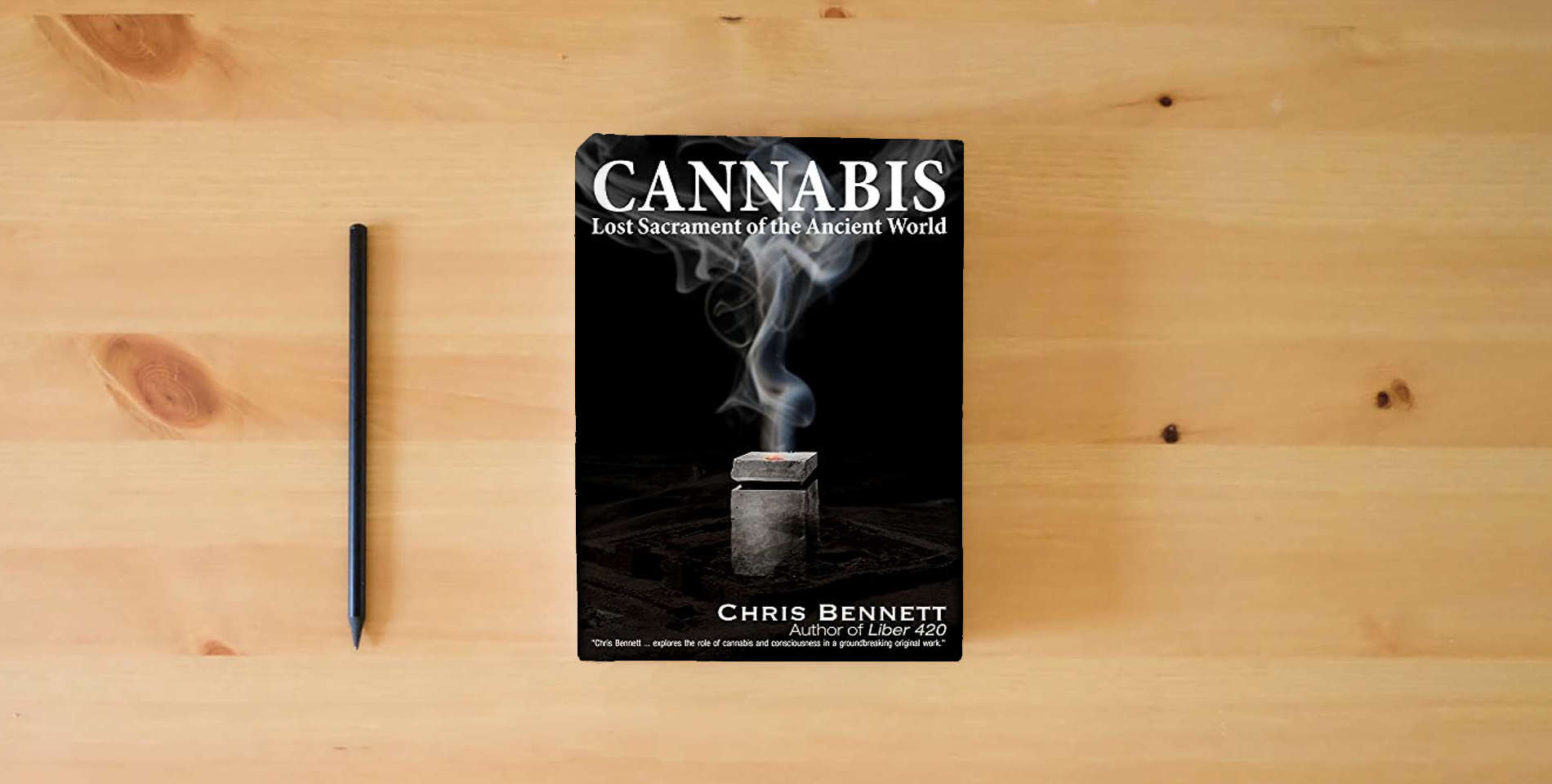 The book Cannabis: Lost Sacrament of the Ancient World is on the table