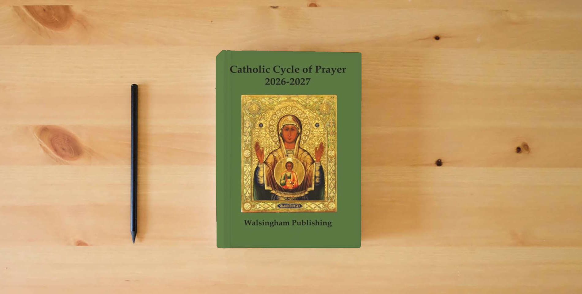 The book Catholic Cycle of Prayer 2026-2027 is on the table