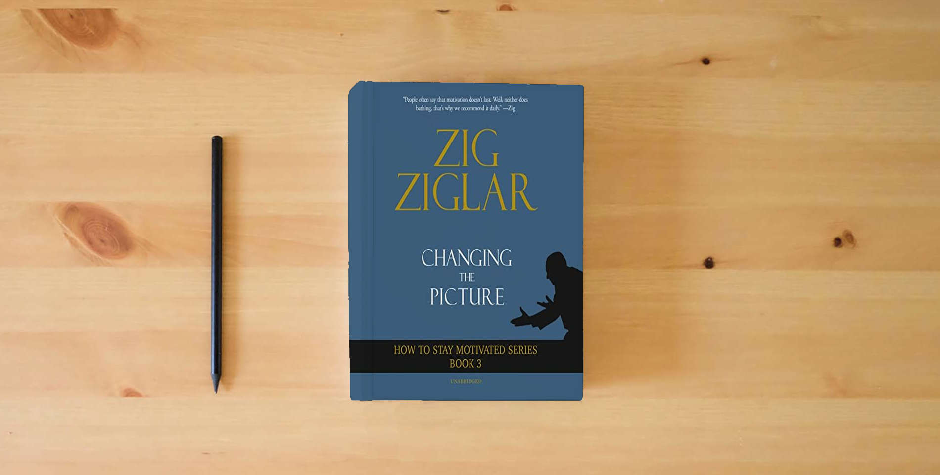 The book Changing the Picture: How to Stay Motivated Book 3 is on the table