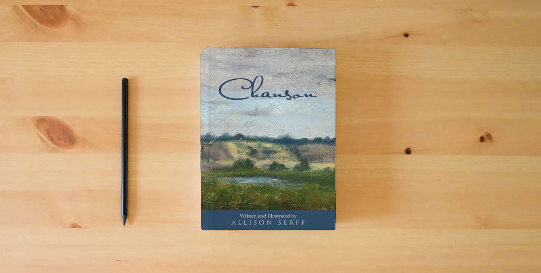 The book Chanson is on the table