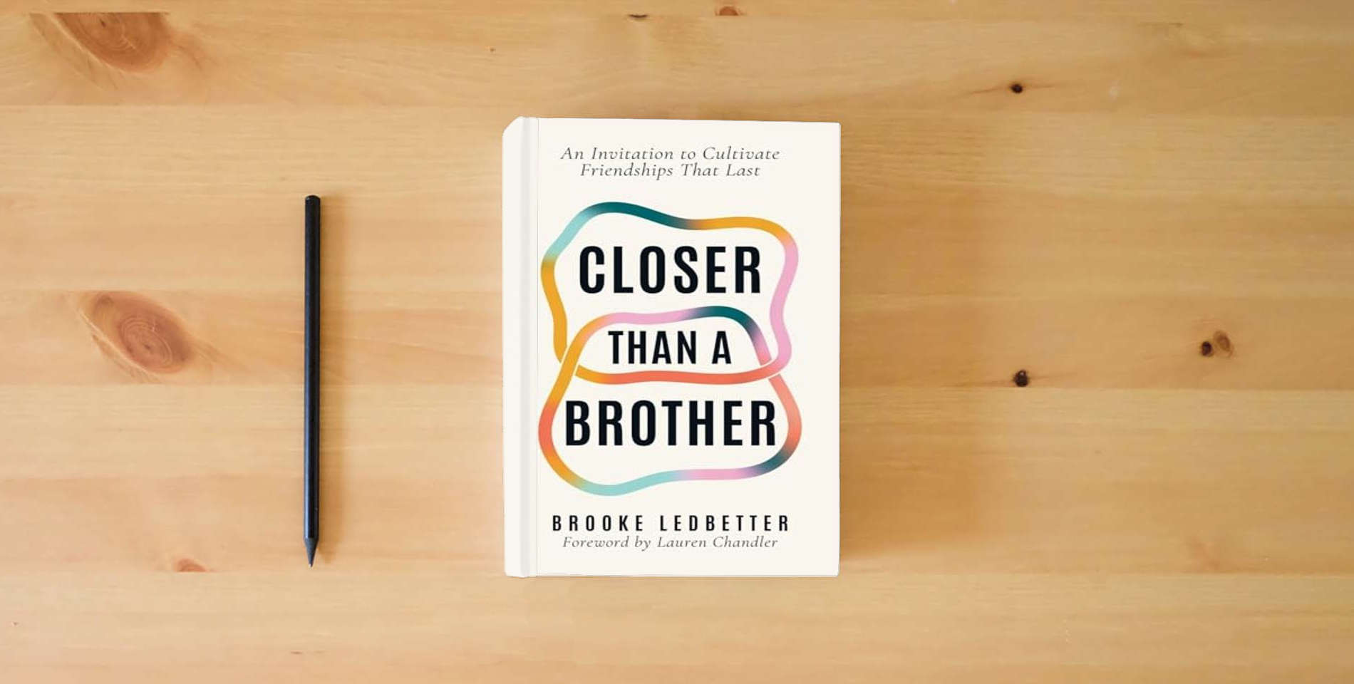The book Closer Than A Brother: An Invitation to Cultivate Friendships That Last is on the table