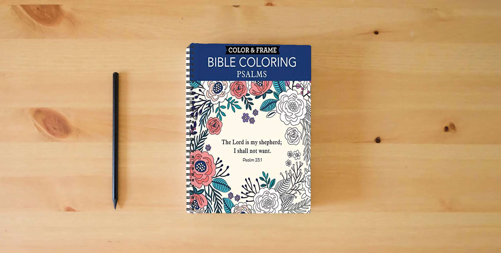 The book Color & Frame - Bible Coloring: Psalms: 63 Coloring Pages with Bible Verses | Christian Devotional Book Gift for Women, Adults, Teens & Faith-Based Relaxation | Perforated, Spiral Bound is on the table
