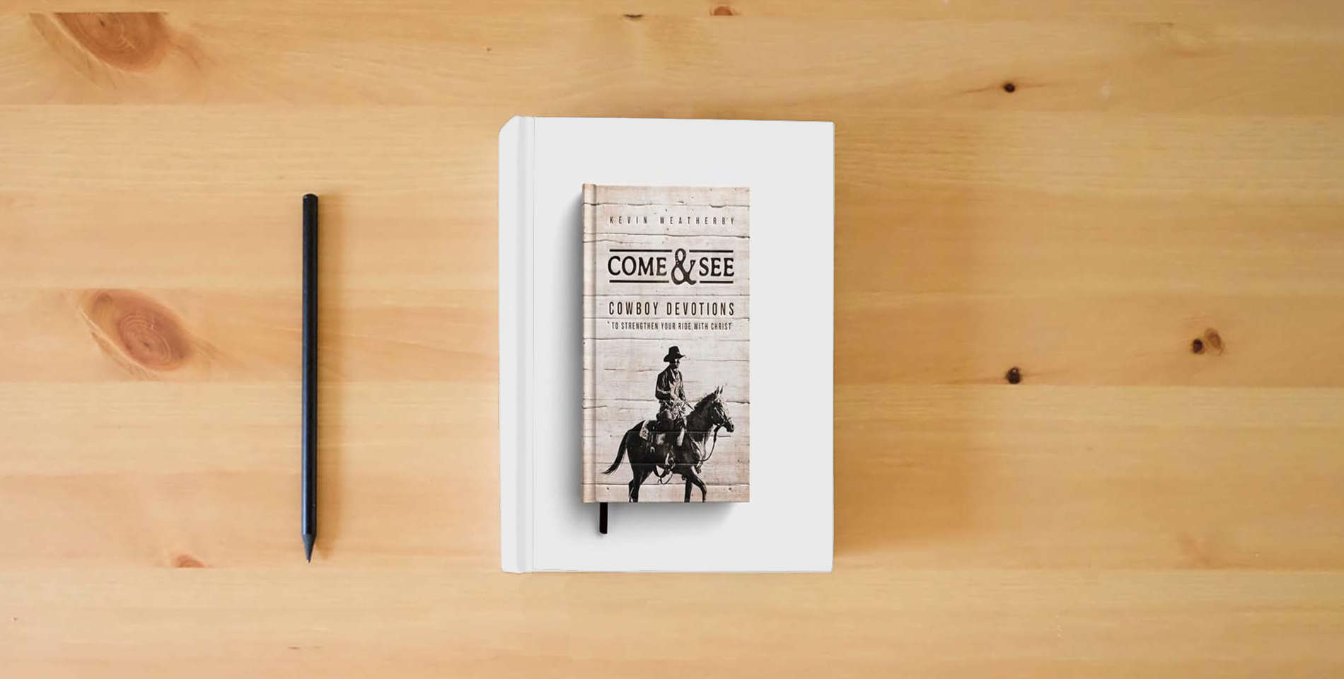 The book Come & See: Cowboy Devotions to Strengthen Your Ride with Christ is on the table