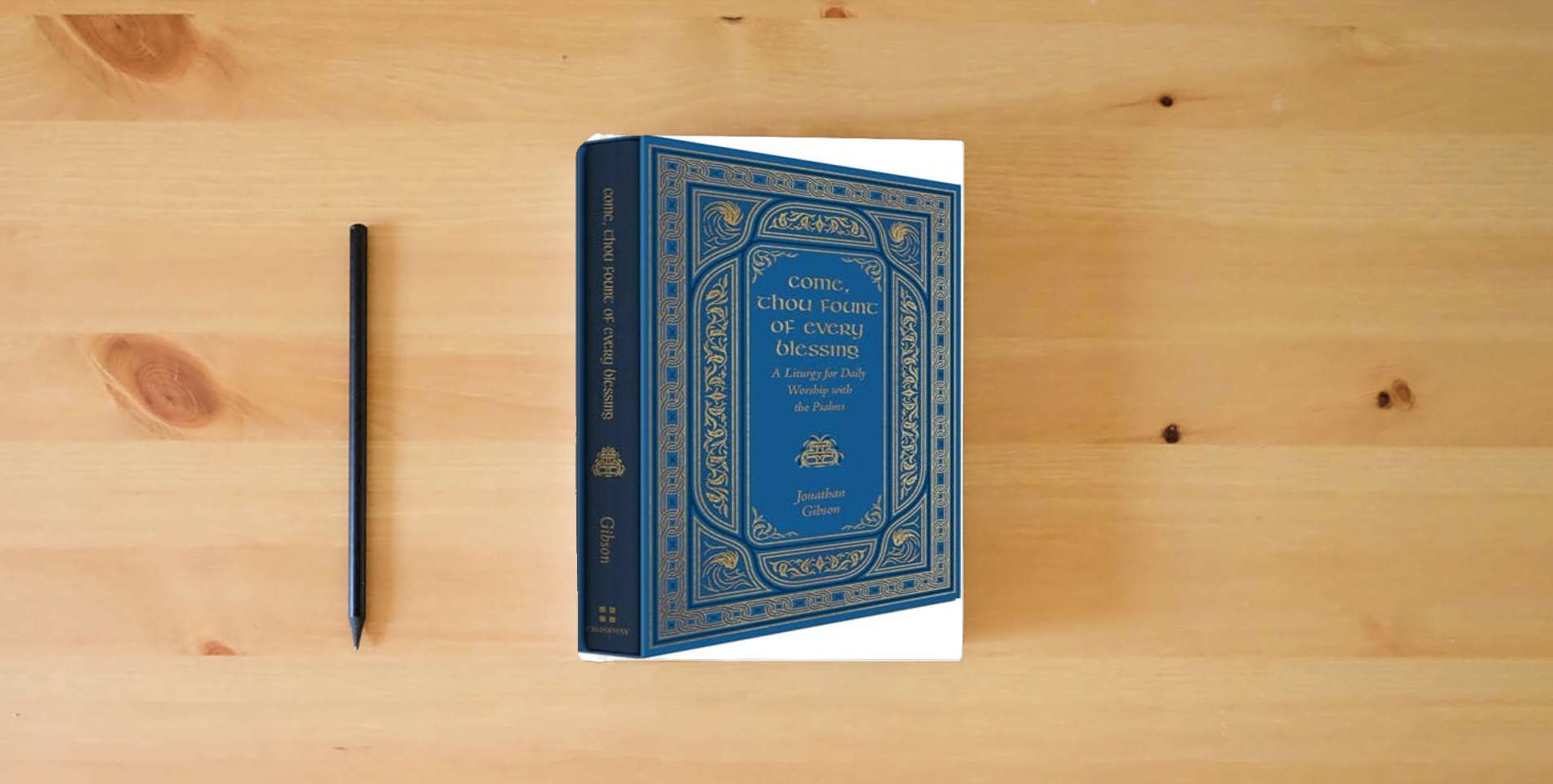 The book Come, Thou Fount of Every Blessing: A Liturgy for Daily Worship with the Psalms is on the table