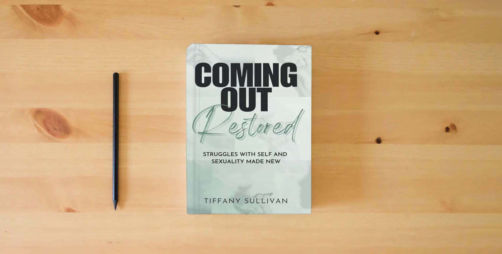 The book Coming Out Restored: Struggles with Self and Sexuality Made New is on the table