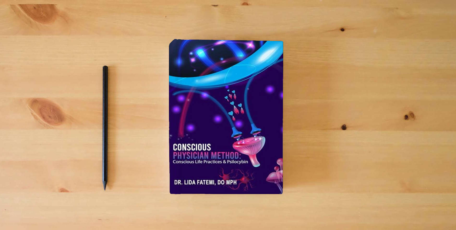 The book Conscious Physician Method: Conscious Life Practices & Psilocybin is on the table