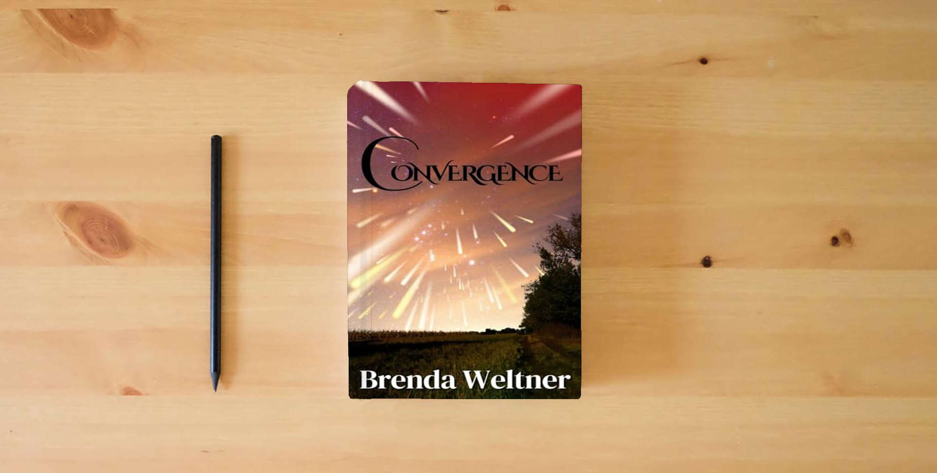The book Convergence is on the table