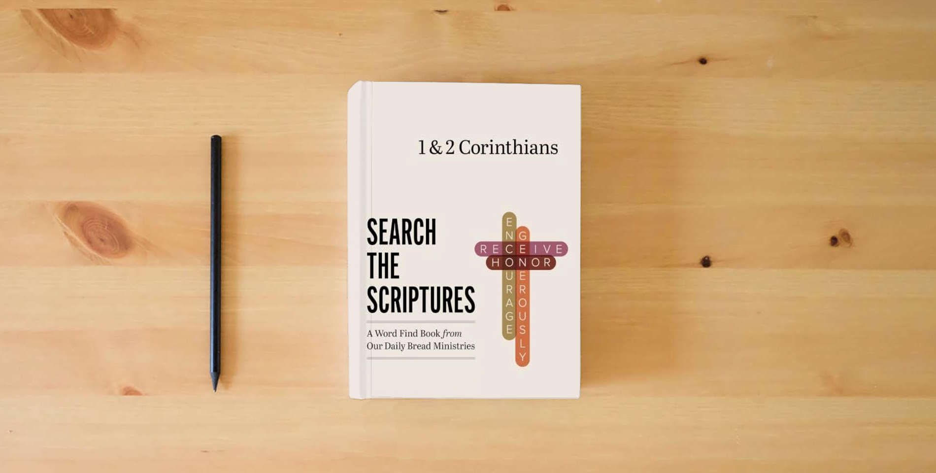 The book 1 & 2 Corinthians: A Word Find Book from Our Daily Bread Ministries (Search the Scriptures) is on the table