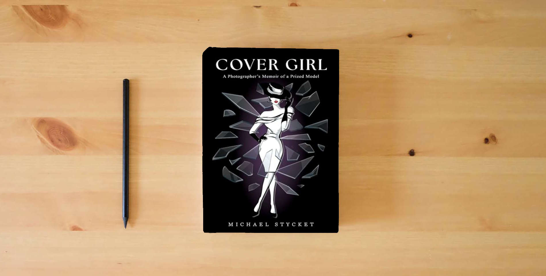 The book Cover Girl: A Photographer's Memoir of a Prized Model is on the table