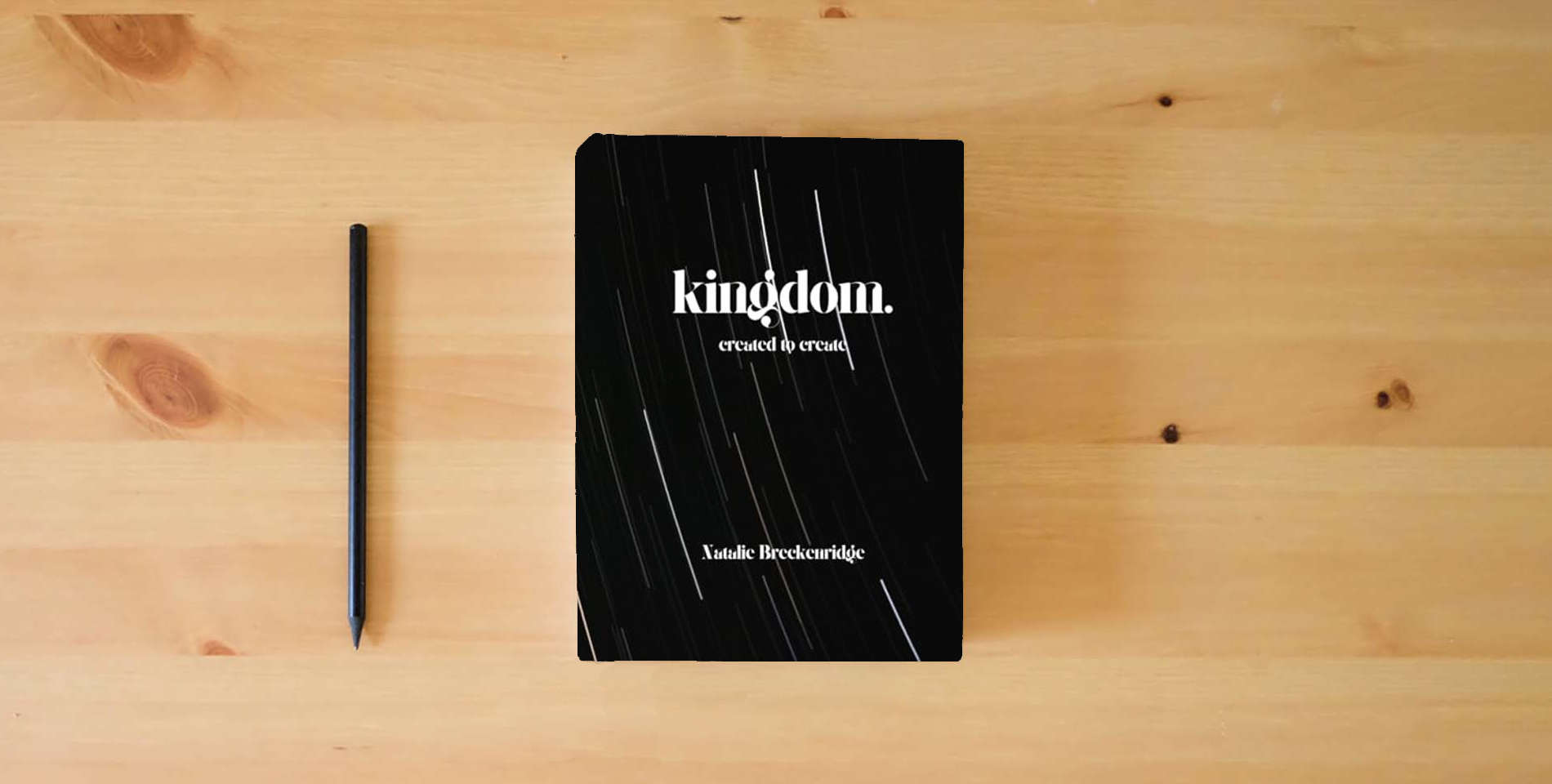 The book Created to Create is on the table