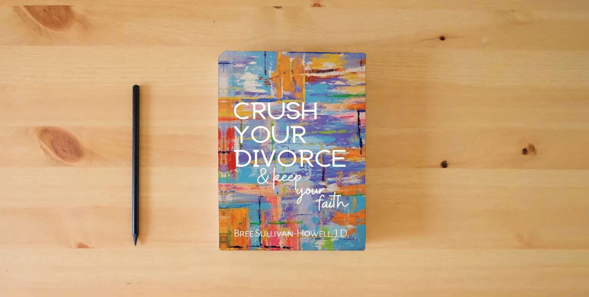 The book Crush Your Divorce and Keep Your Faith is on the table