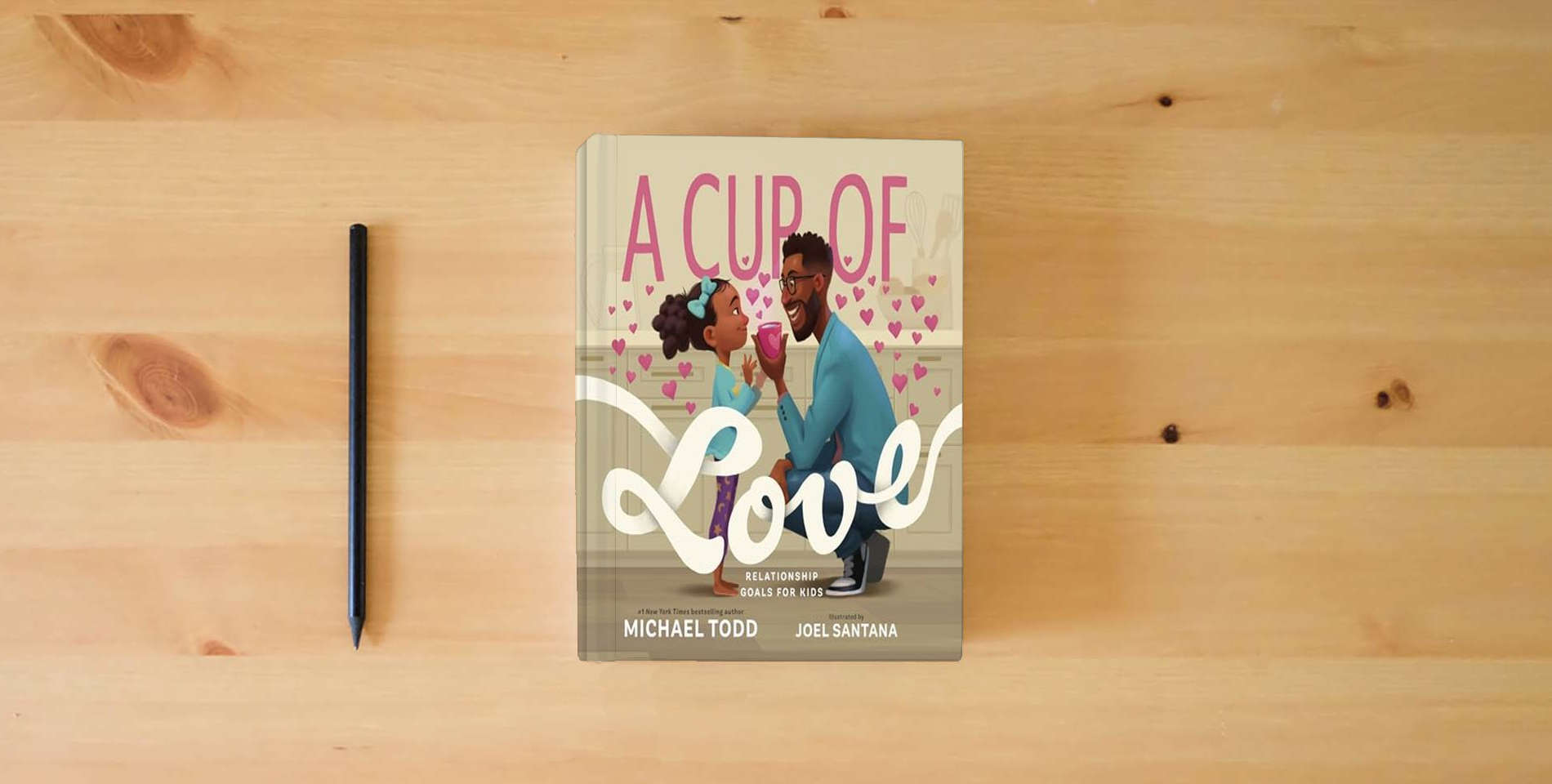 The book A Cup of Love: Relationship Goals for Kids is on the table