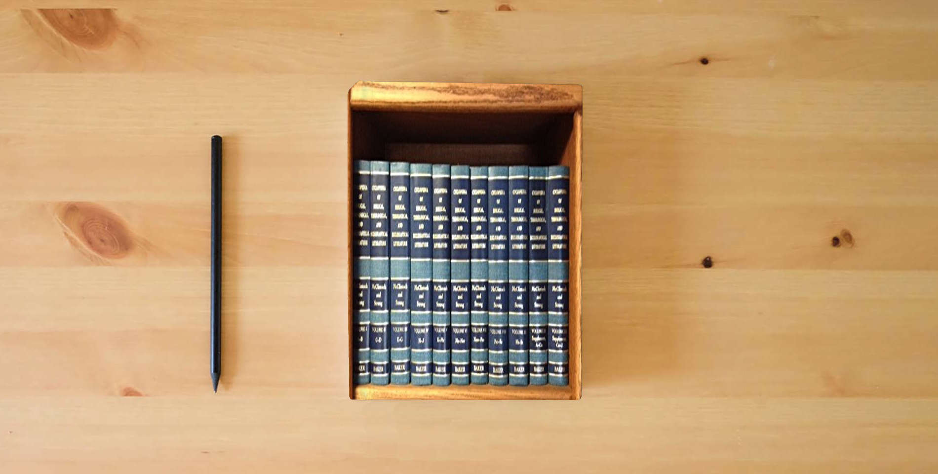 The book Cyclopedia of Biblical, Theological, and Ecclesiastical Literature : 12 Volumes is on the table