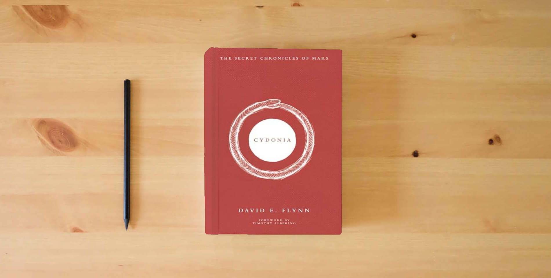 The book Cydonia: The Secret Chronicles of Mars is on the table