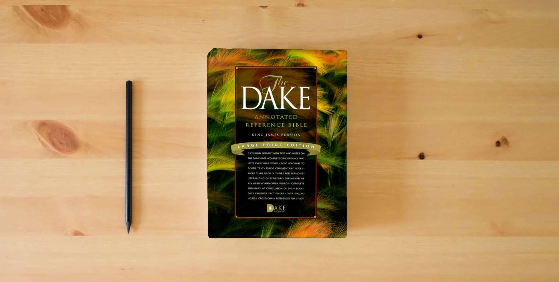 The book Dake Annotated Reference Bible-KJV-Large Print is on the table