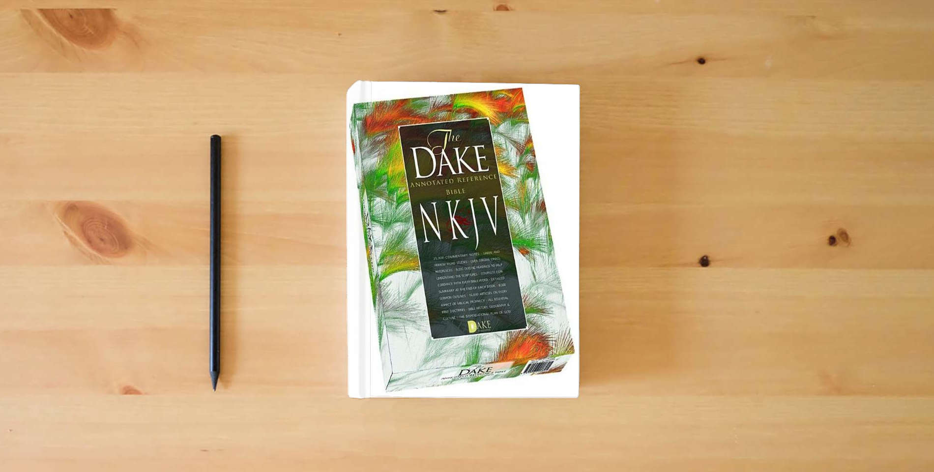 The book Dake's Annotated Reference Bible: New Kings James Version, Black Leathersoft is on the table